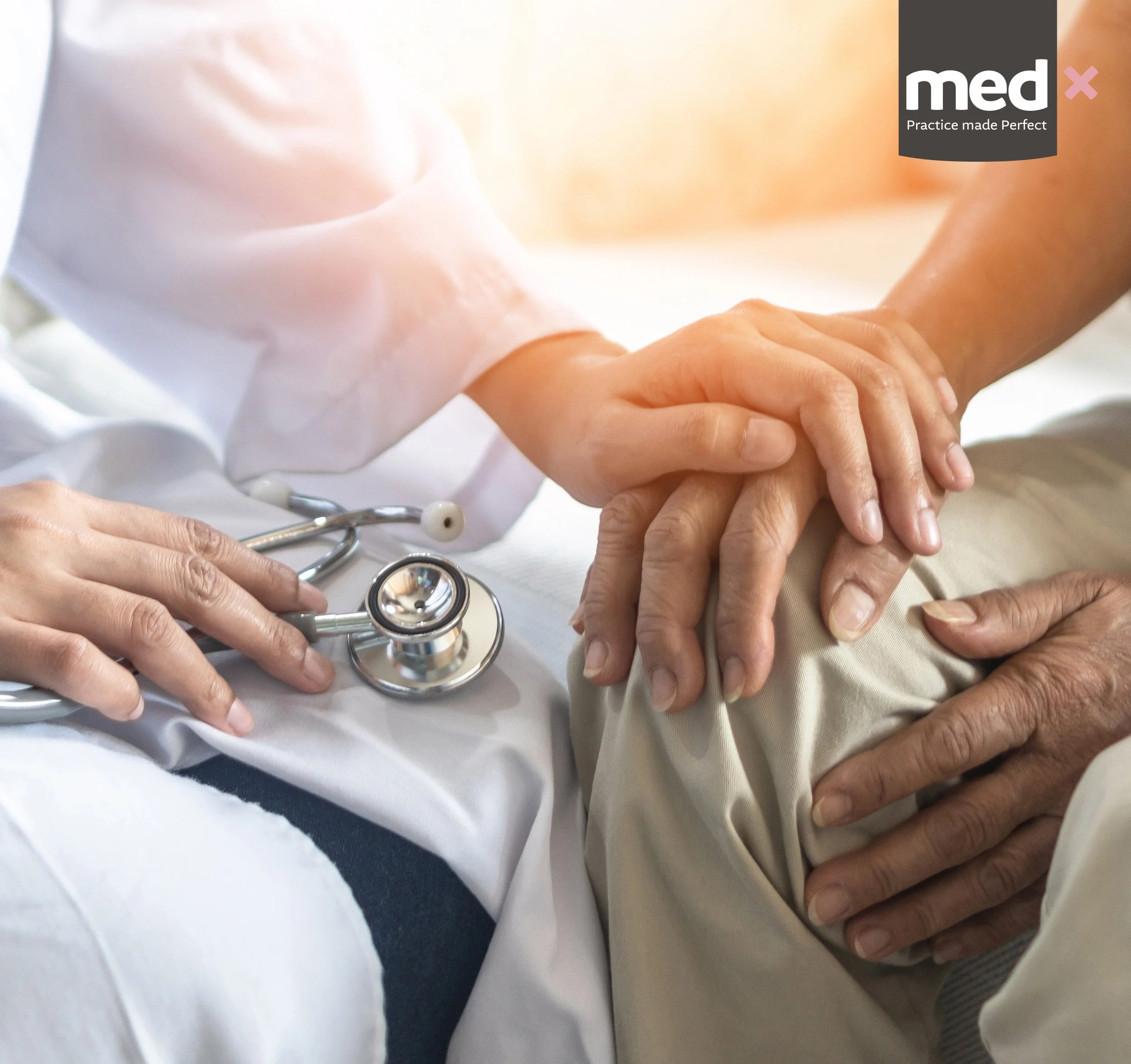 Close-up of a healthcare worker examining an elderly patient's hand, with a stethoscope on a white surface in the background.
