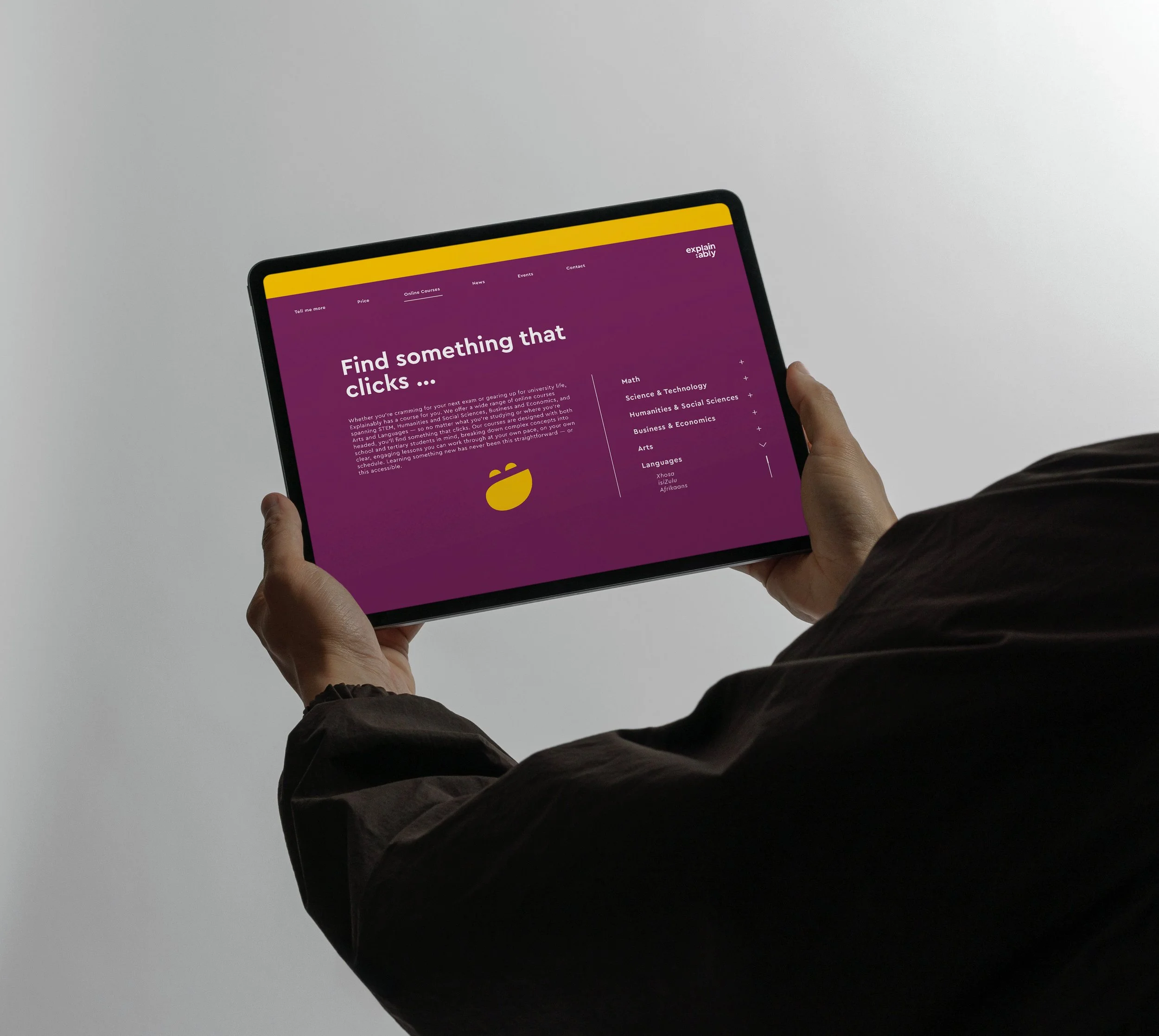 Guy on an iPad browsing through the Explain:ably online portal app to view the available sessions to join.