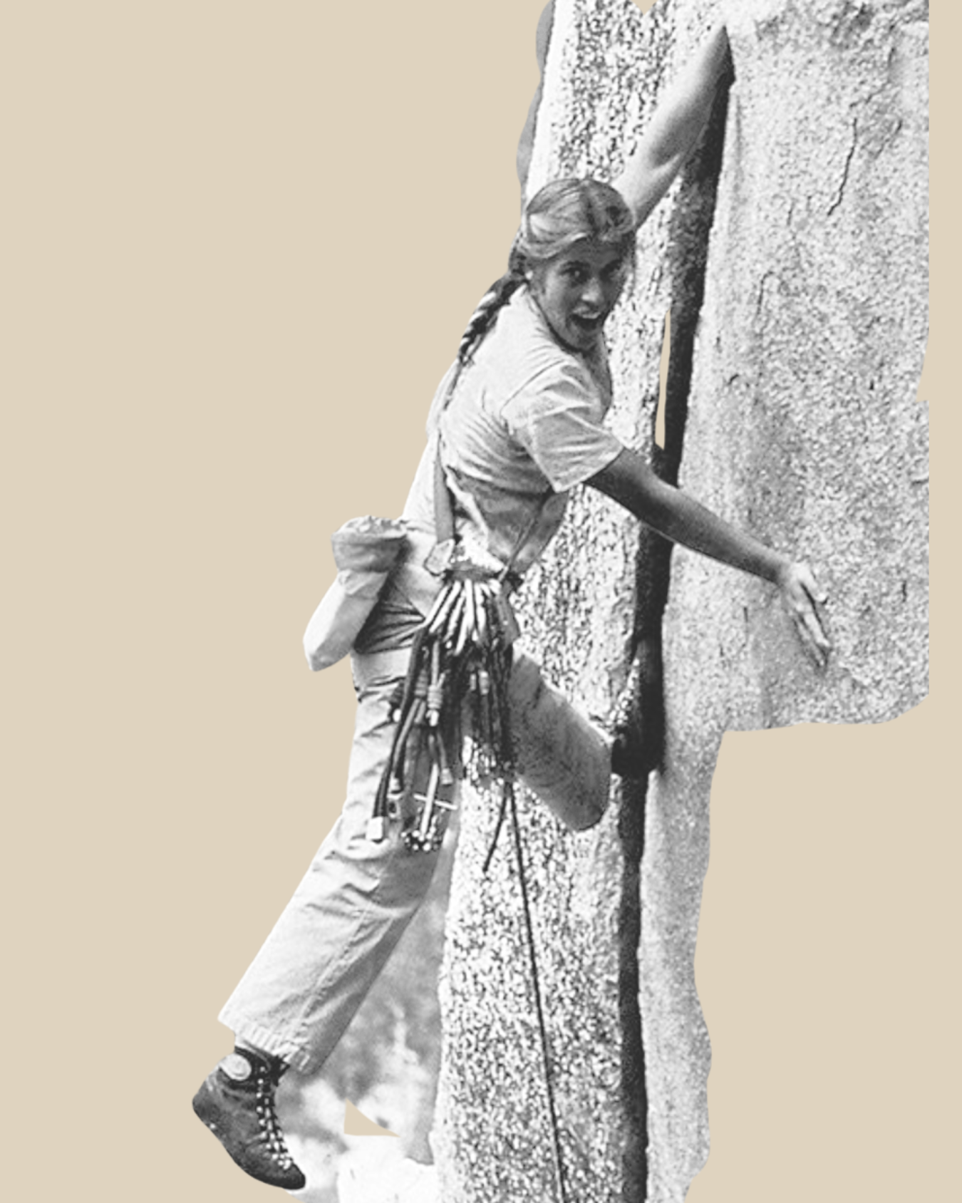 A woman rock climbing on a vertical rock face, smiling and reaching upwards.