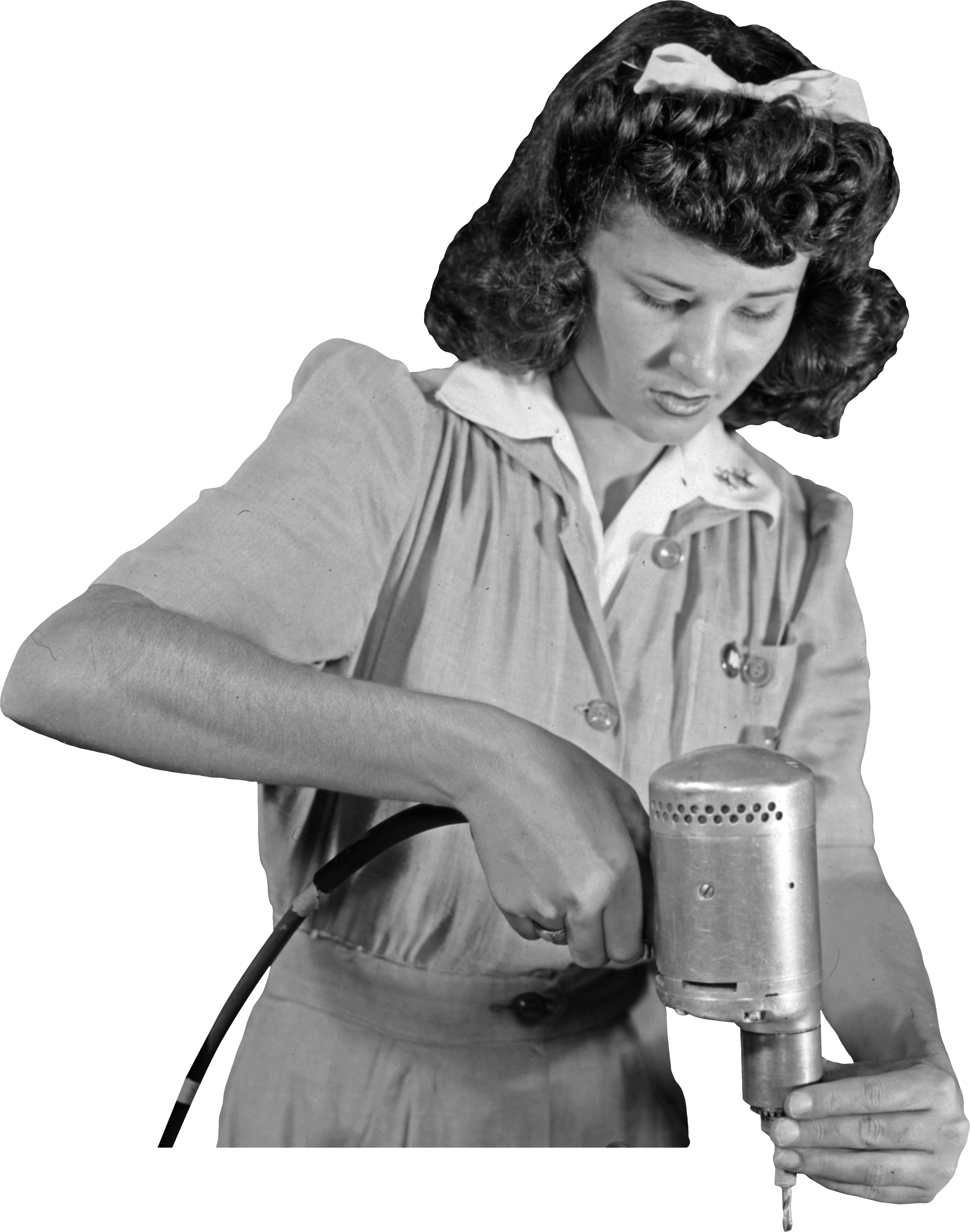 A woman with dark, curly hair, dressed in a vintage uniform, operating a power drill.