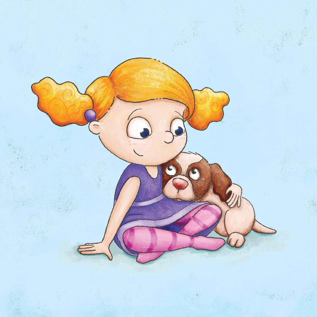 A young girl with orange pigtails and glasses sitting cross-legged on the floor, hugging a brown and white puppy with big eyes.
