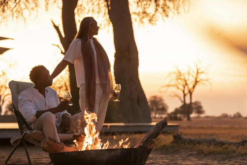 Drinks Around the Fire, Sunset, Zimbabwe Lodge