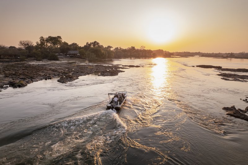 Sunset motorboat cruise on the Zambezi above Victoria Falls, Mosi-oa-Tunya, Zambia
