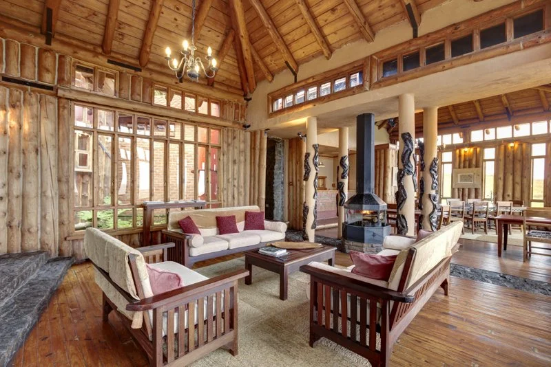 Charming pine log cabin lodge nestled in Nyika National Park, Malawi.