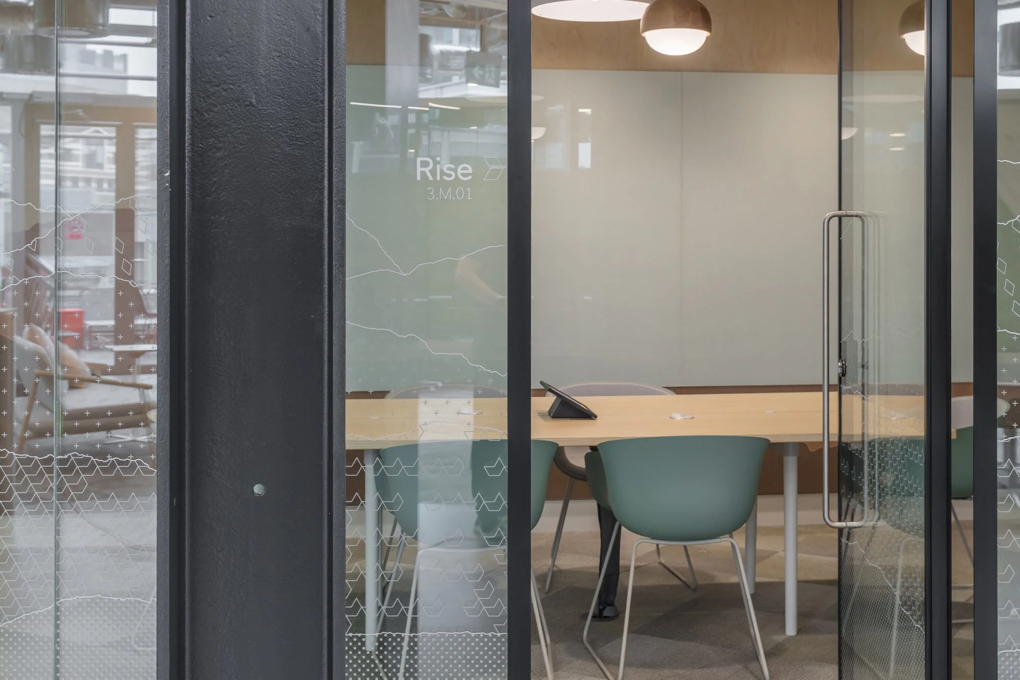 Glass manifestations in office meeting room