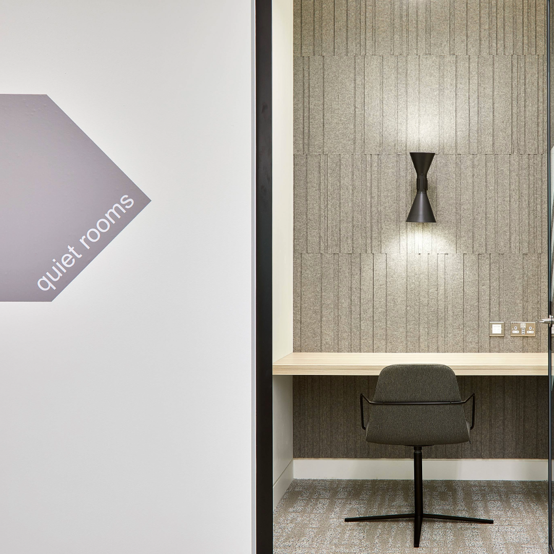 Small meeting room with vinyl door sign that says: quiet rooms