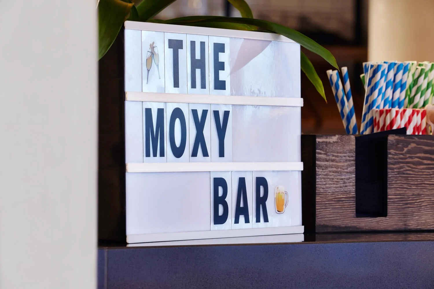 Moxy bar sign