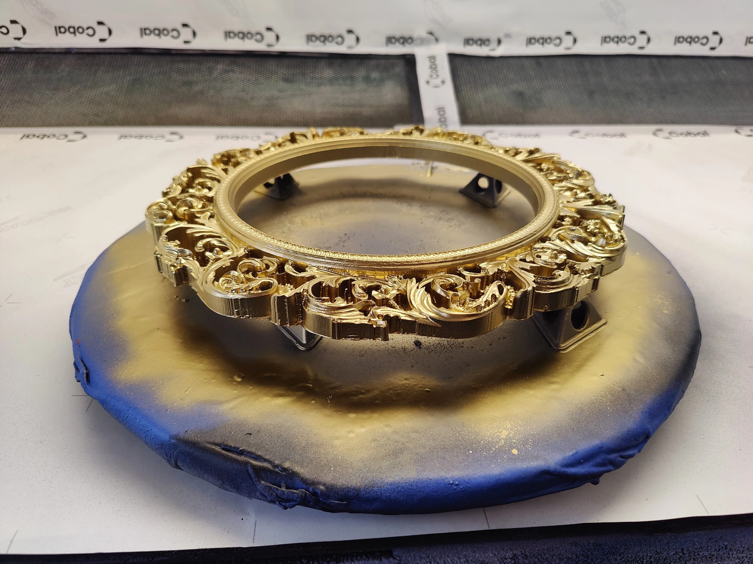 Gold paint drying on sign