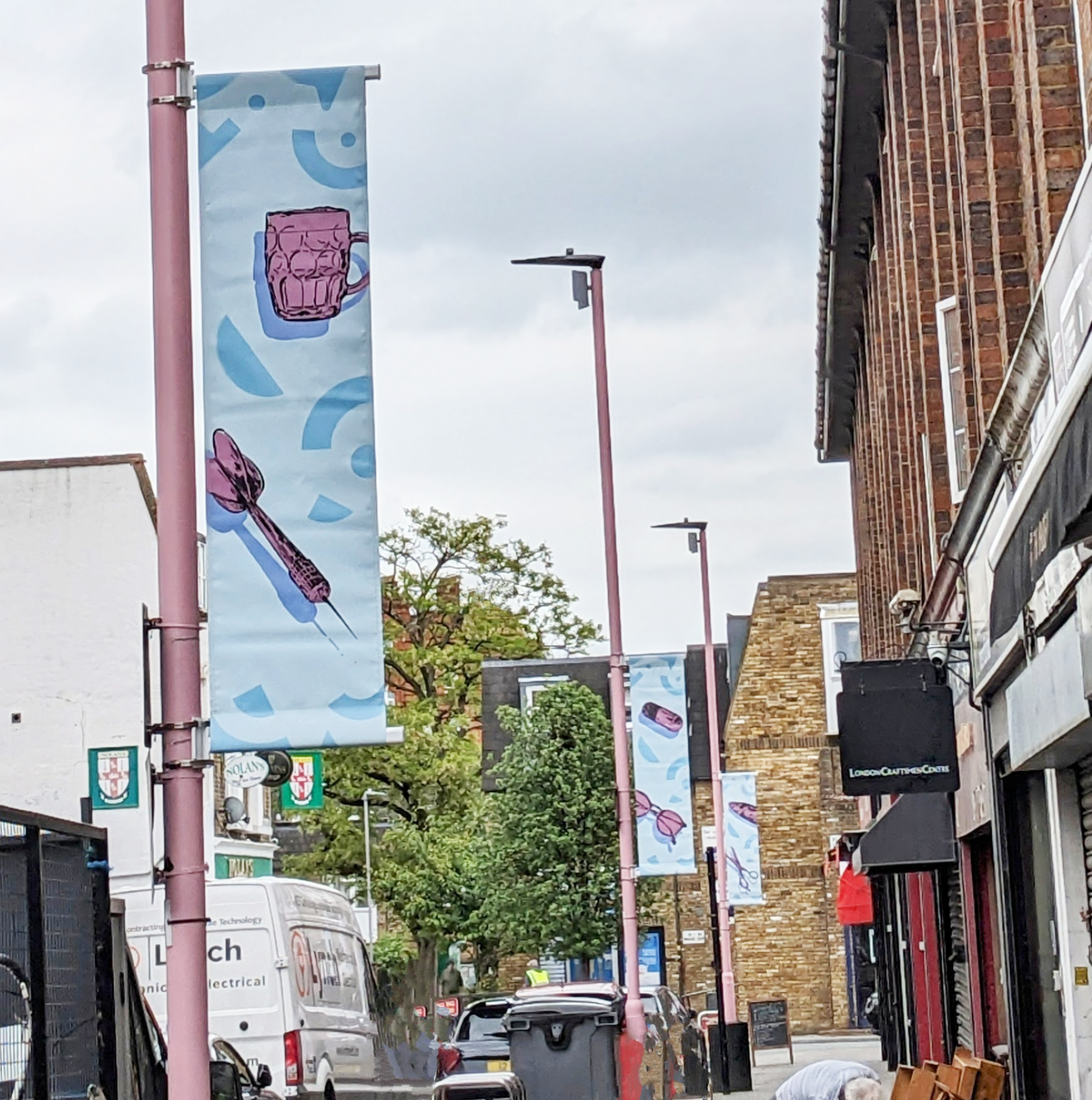 Lamp post banner in urban street