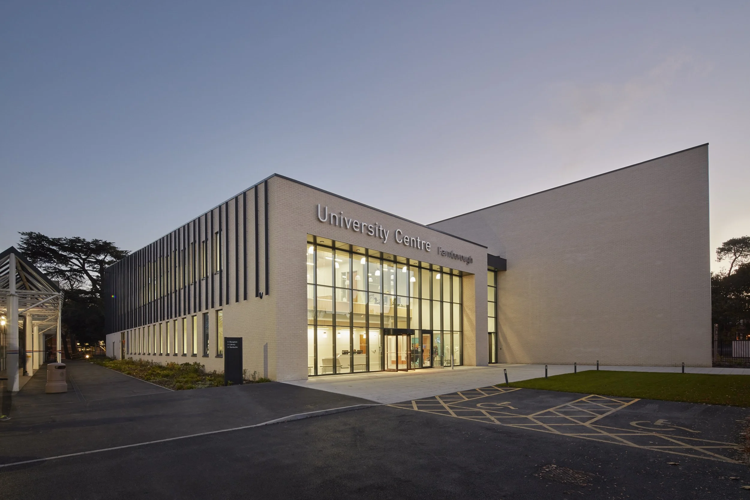 University Centre Farnborough Exterior & monolith at dusk