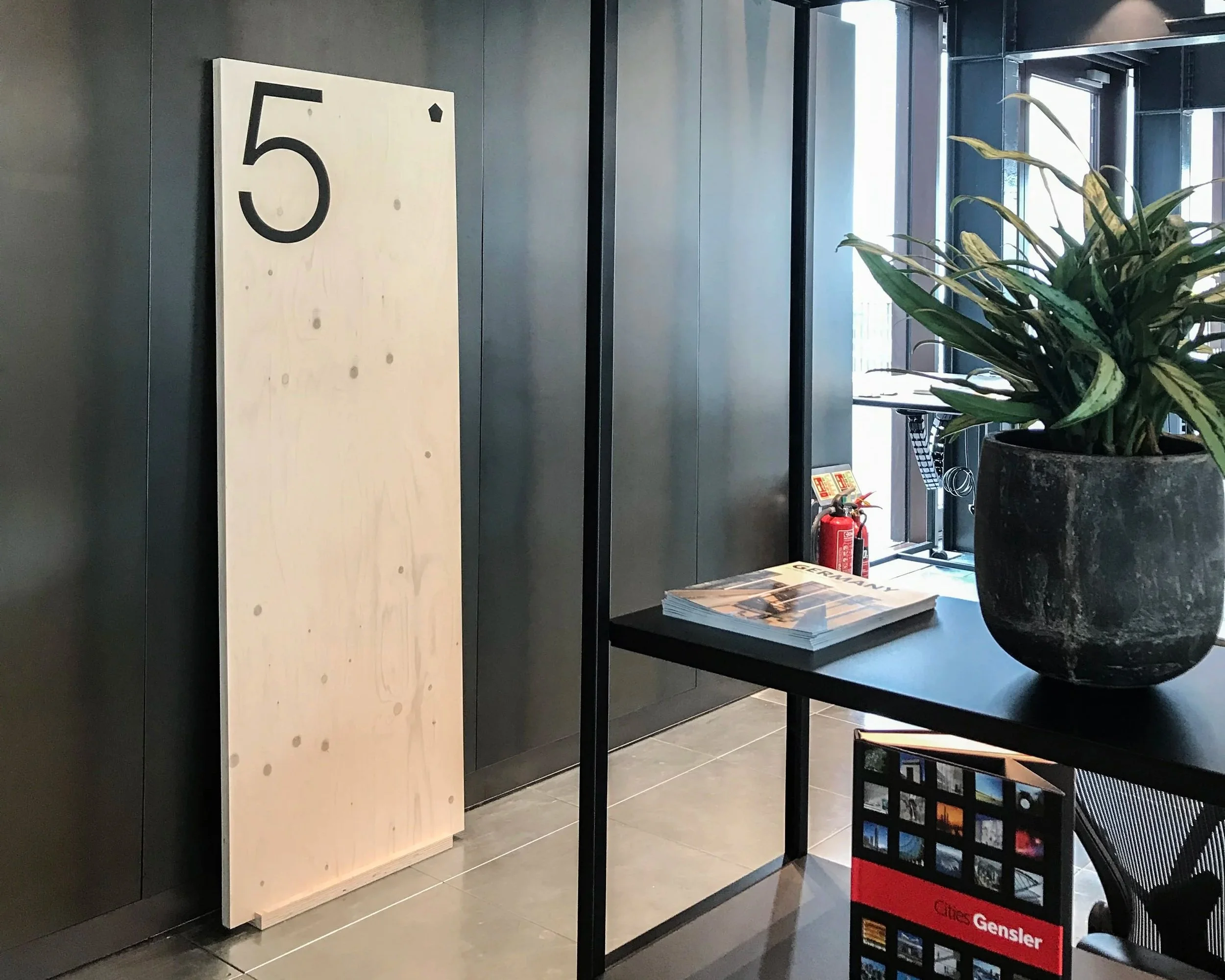 Spruce and plywood sustainable interior sign