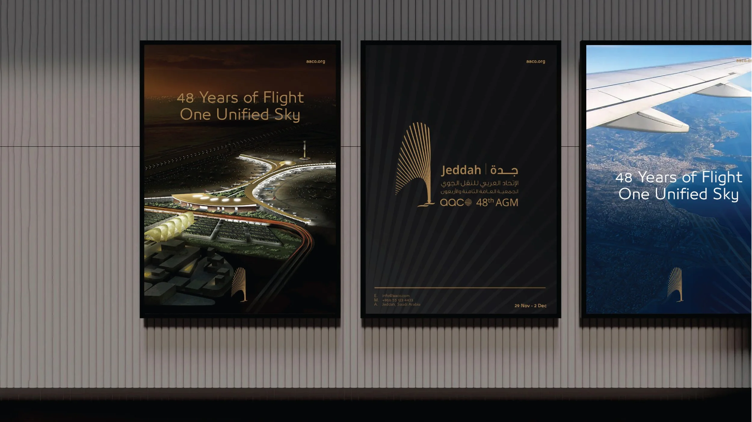 Three posters on a wall celebrating 48 years of flight by the Arab Aviation Club, featuring a cityscape and airplane wing view from an airplane window.