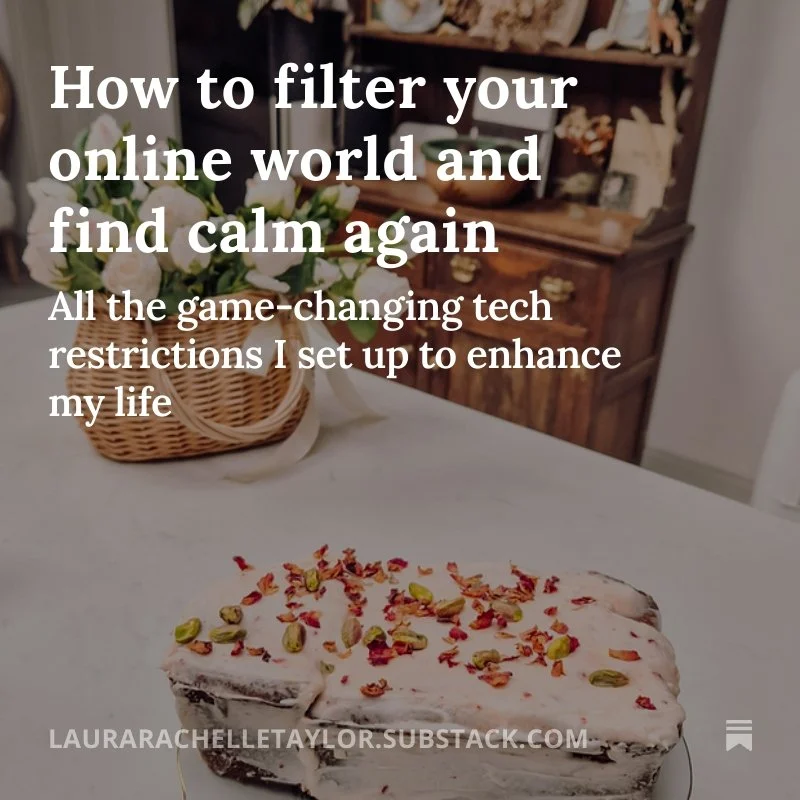 A table with a white tablecloth, a bowl of white flowers, a basket, and a rectangular cake with white icing and sprinkled nuts.