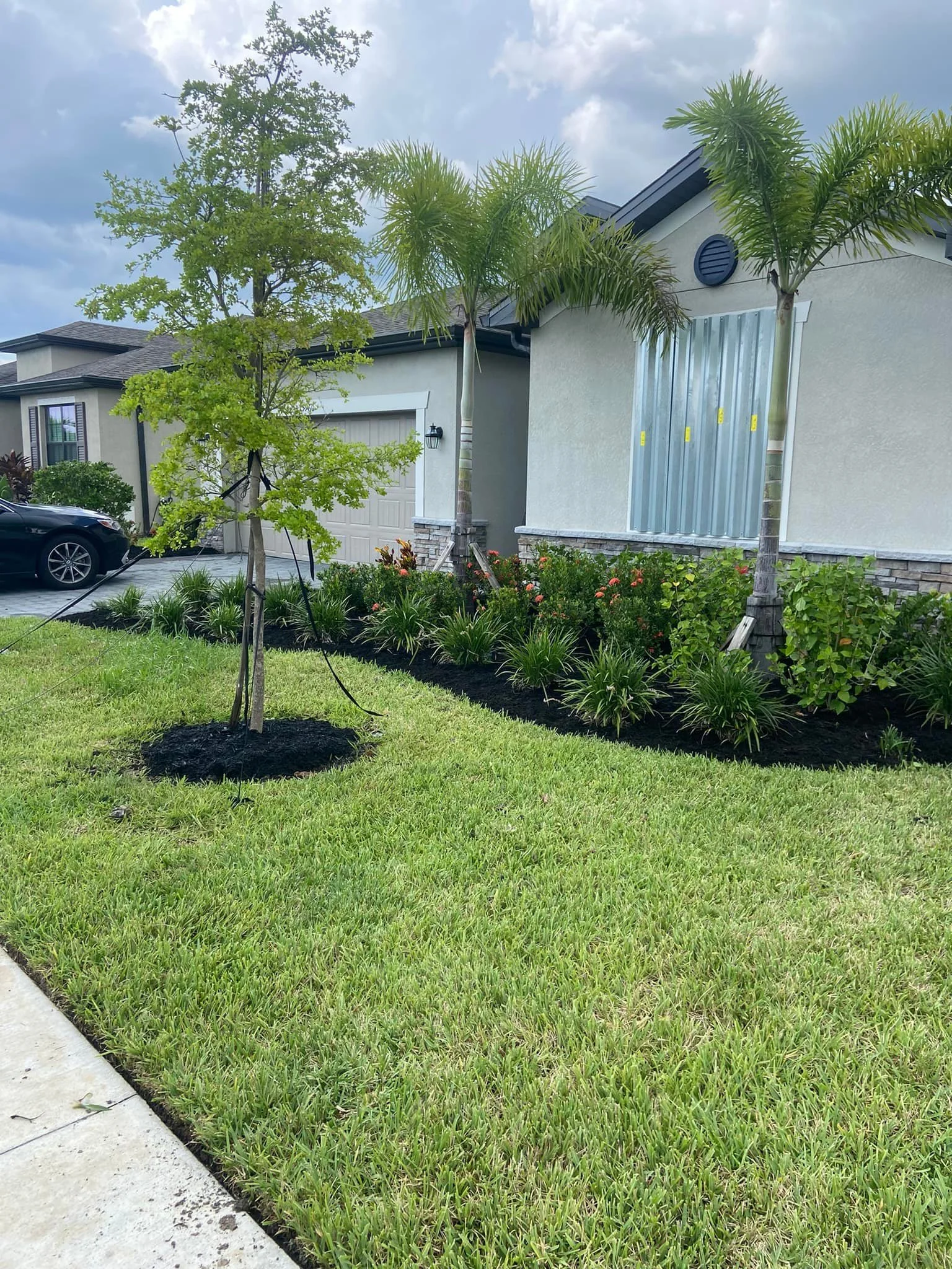 Routine mulch installation for Port Charlotte home.