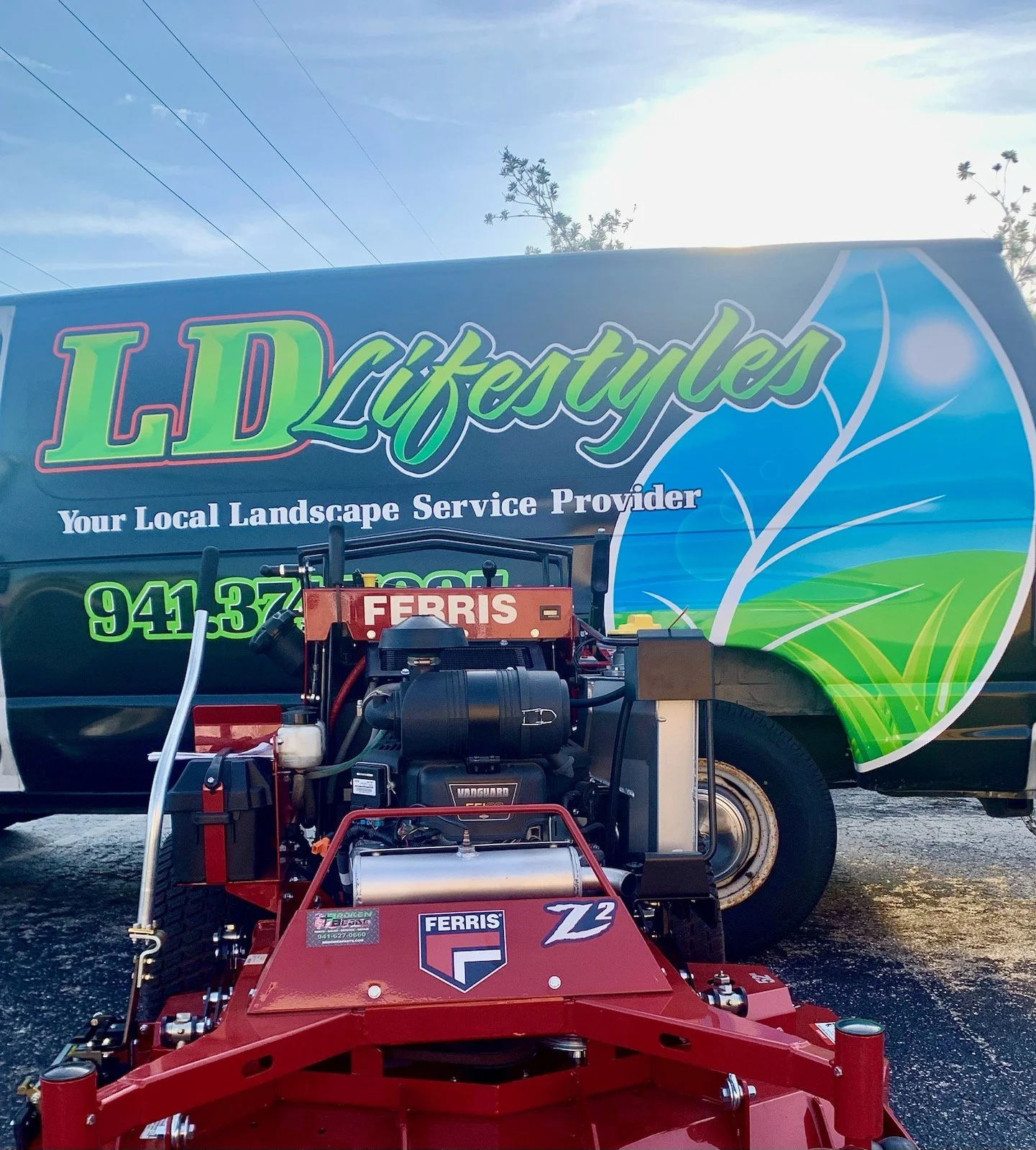 LD Lifestyles vehicle and mower.