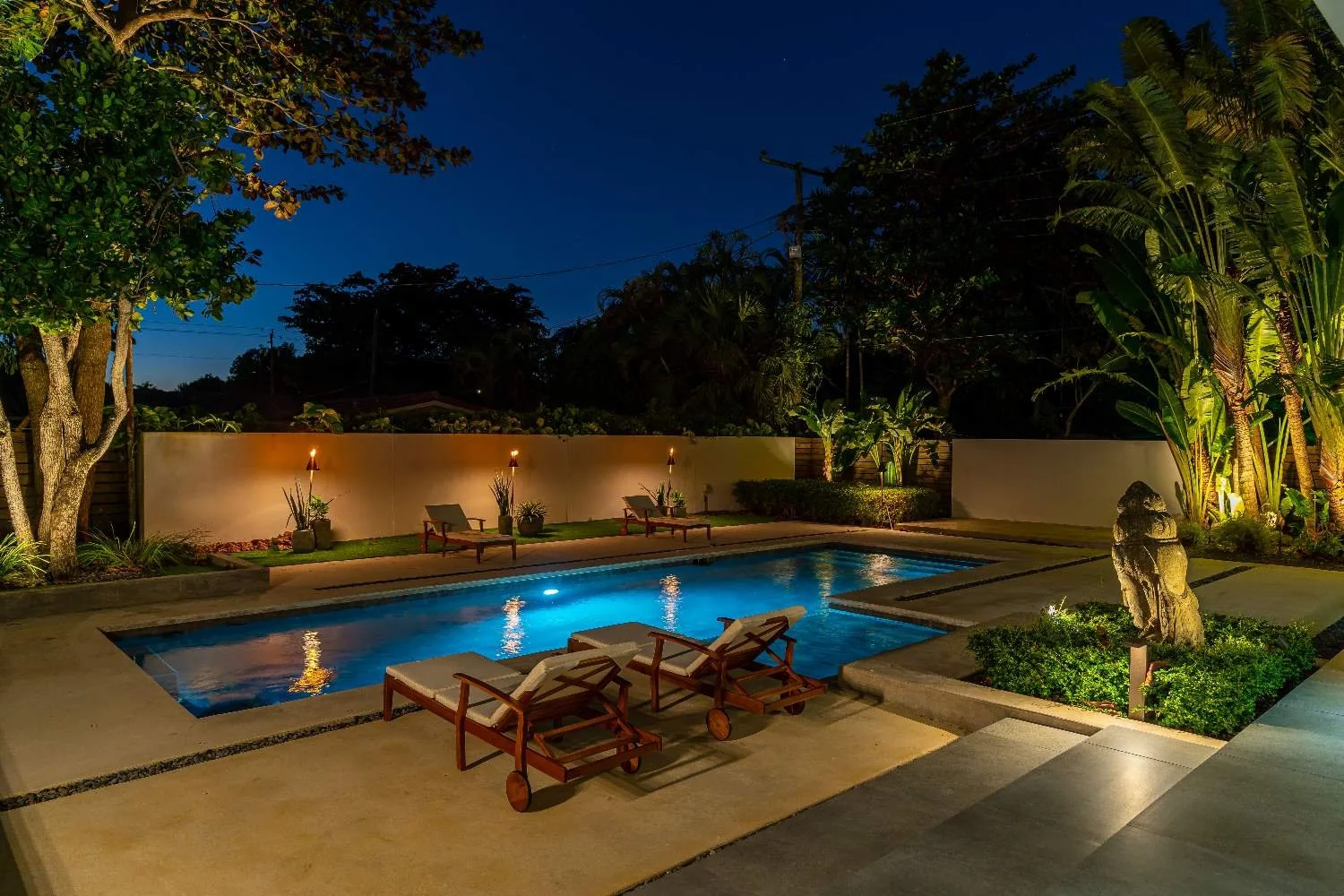 Backyard low voltage lighting installation for Punta Gorda home.