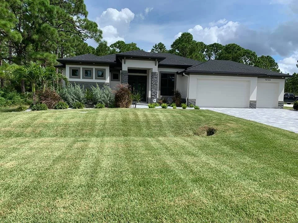 Freshly mowed, edged, and blown off lawn in Port Charlotte by LD Lifestyles.