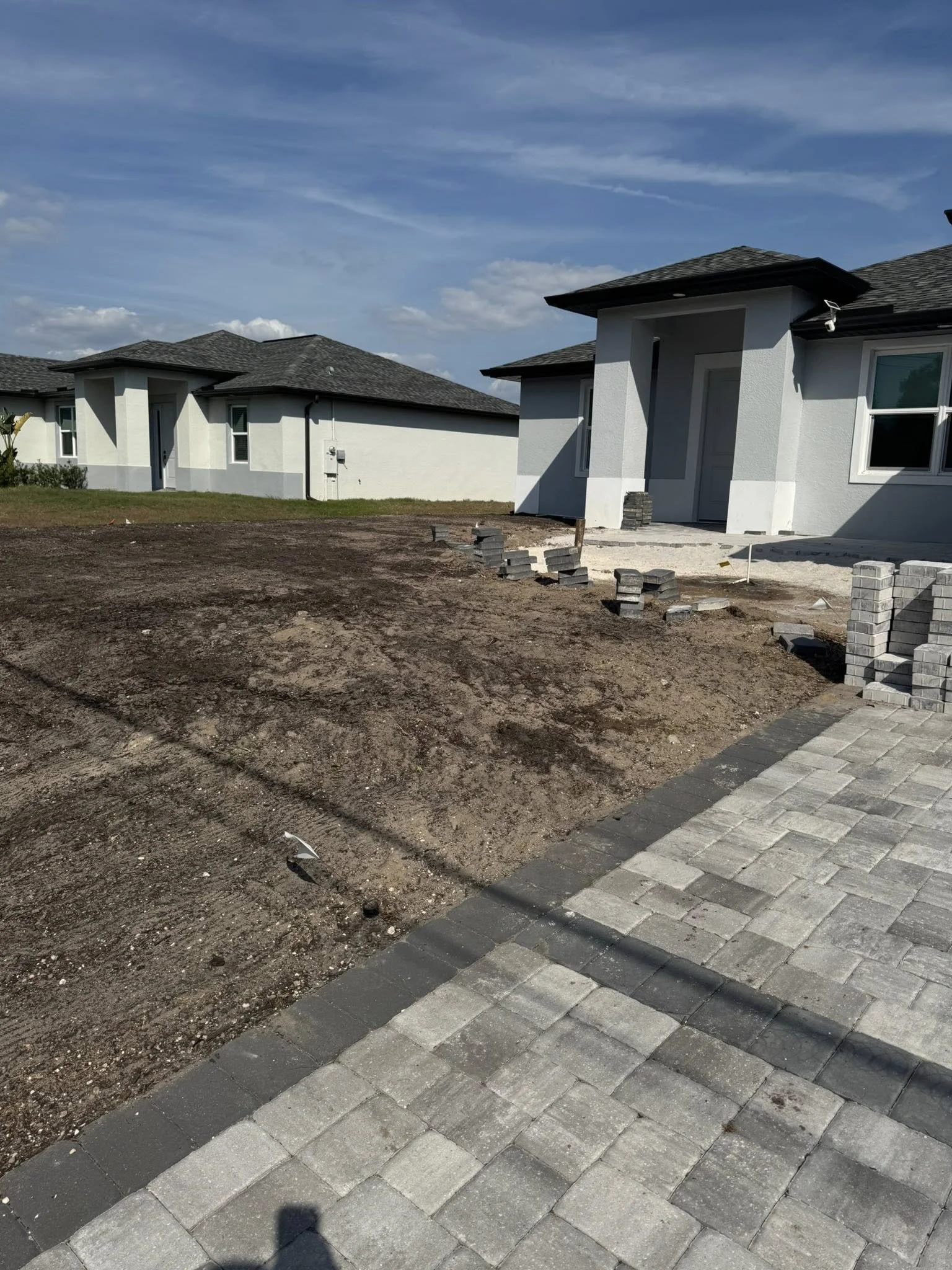 LD Lifestyles preparing the ground for St. Augustine sod installation in North Port, Florida.