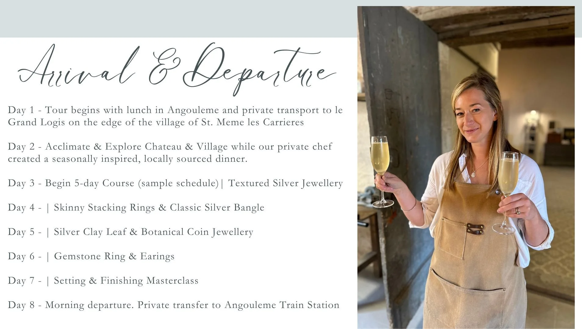 A woman in a beige apron holding two glasses of champagne, standing in a rustic, warmly lit room with exposed wood beams.