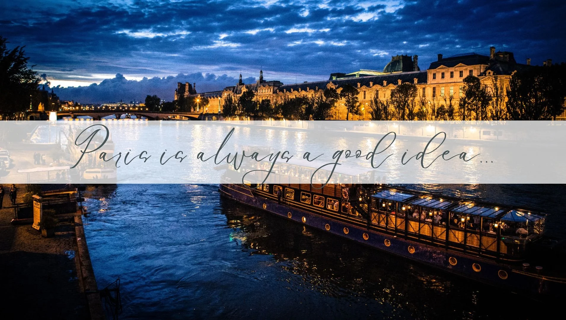 Night view of the Seine River in Paris with illuminated historical buildings and a boat docked near the riverbank, with the quote 'Paris is always a good idea...' overlayed.