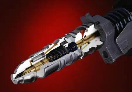 Close-up of an electric drill with an exposed internal mechanism.