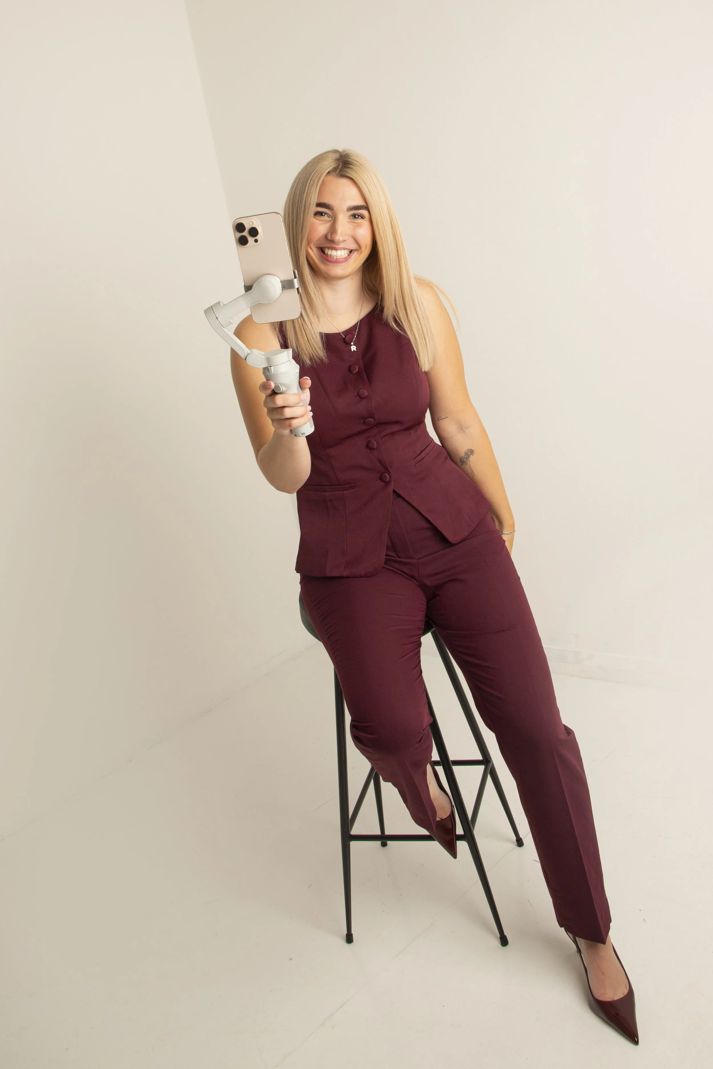 Content creator, holding a gimble with I phone in