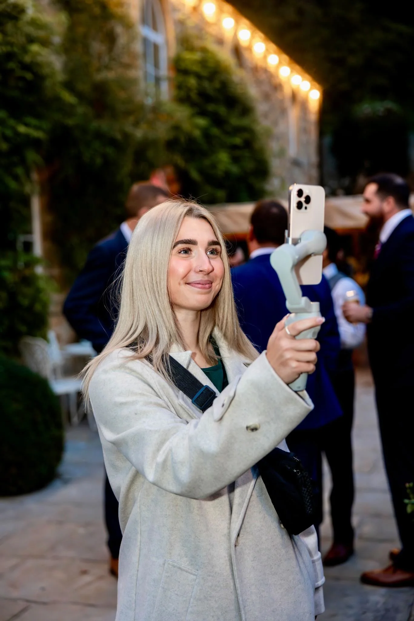 Content creator, holding gimble, capture wedding content