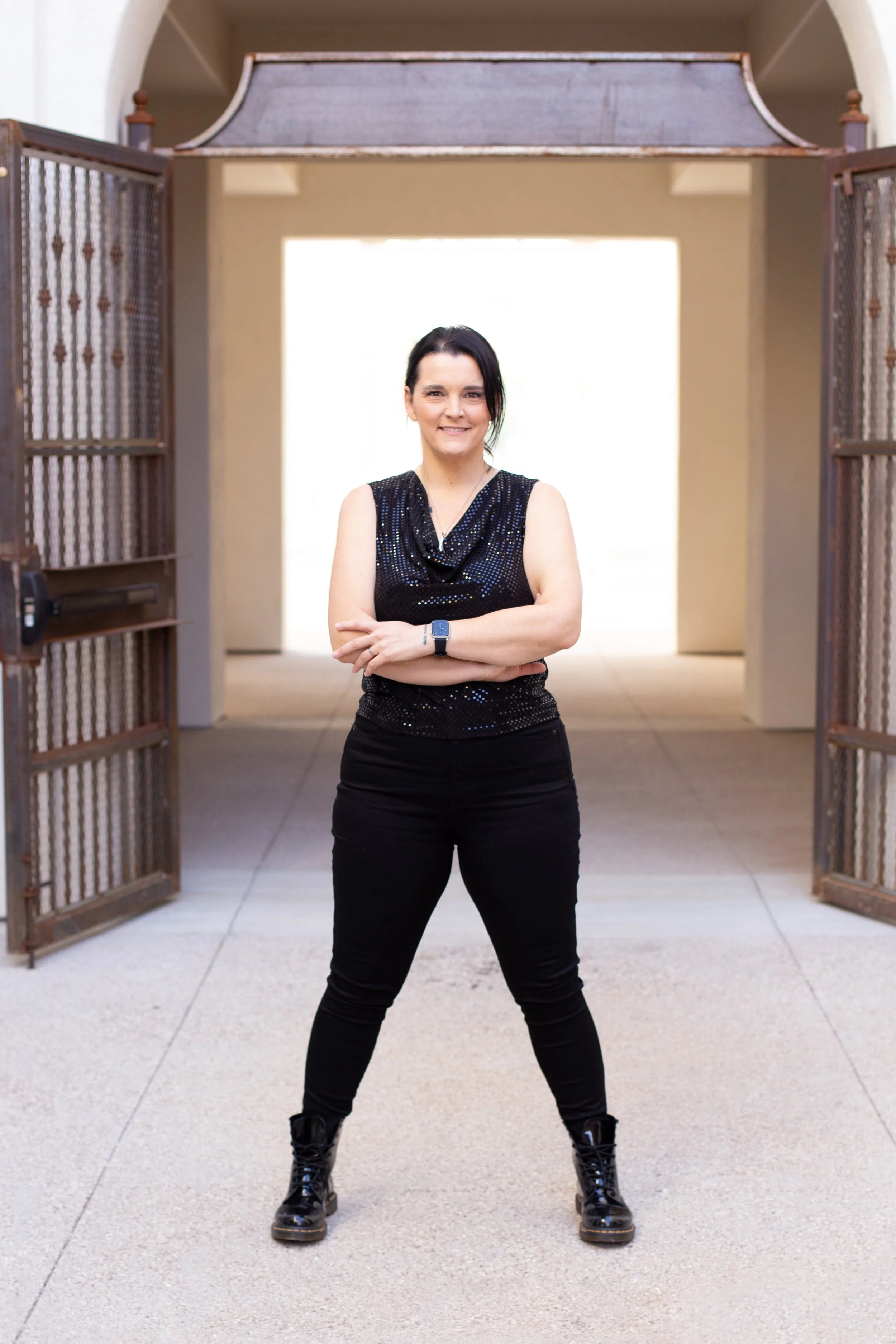 Leadership practitioner standing confidently in a grounded, open stance