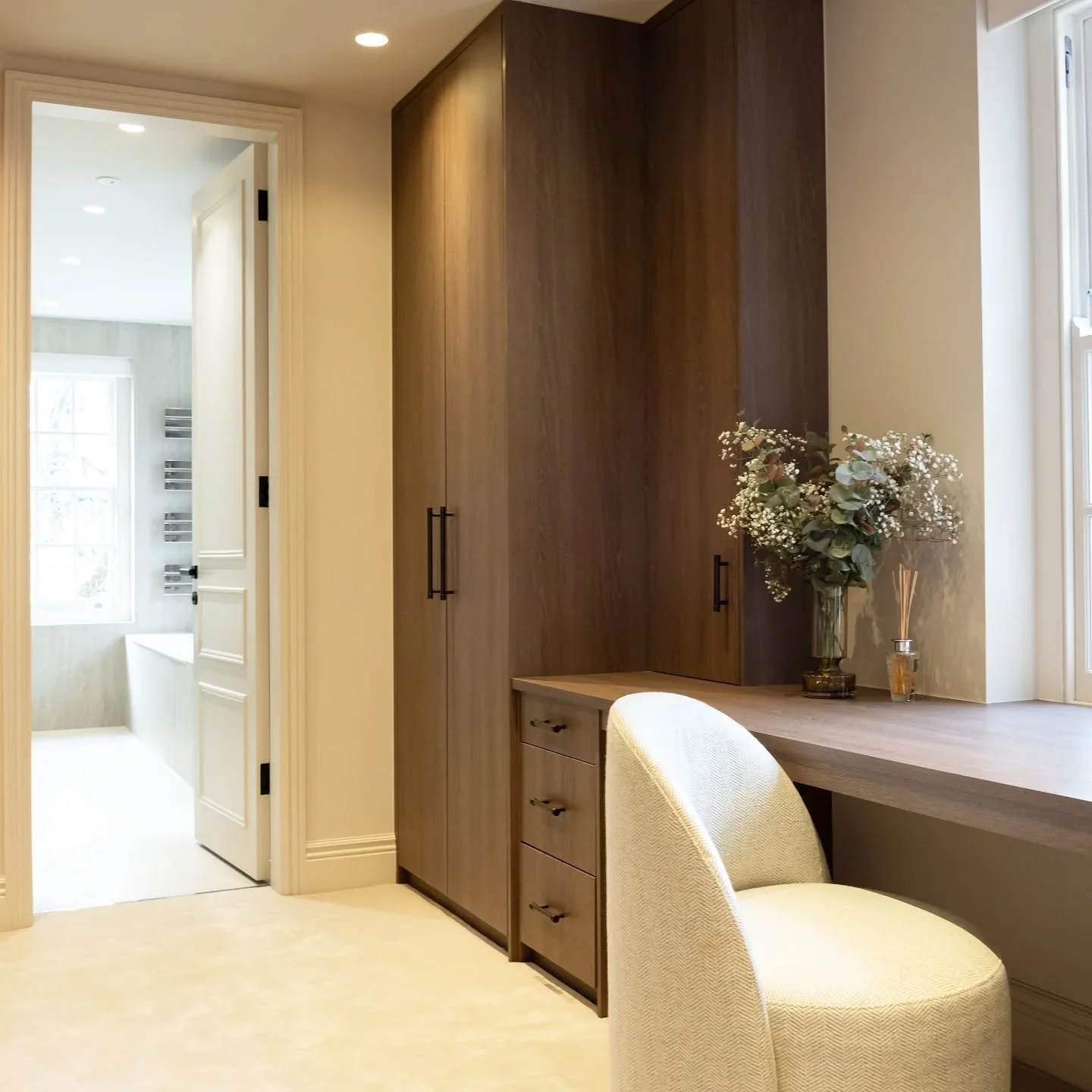 Dressing Room 

Crafted from Brown Orleans Oak, this elegant dressing room offers ample storage to suit every need. Designed with a thoughtful balance of hanging space, shelving, and drawers, it ensures effortless organization for clothing and access