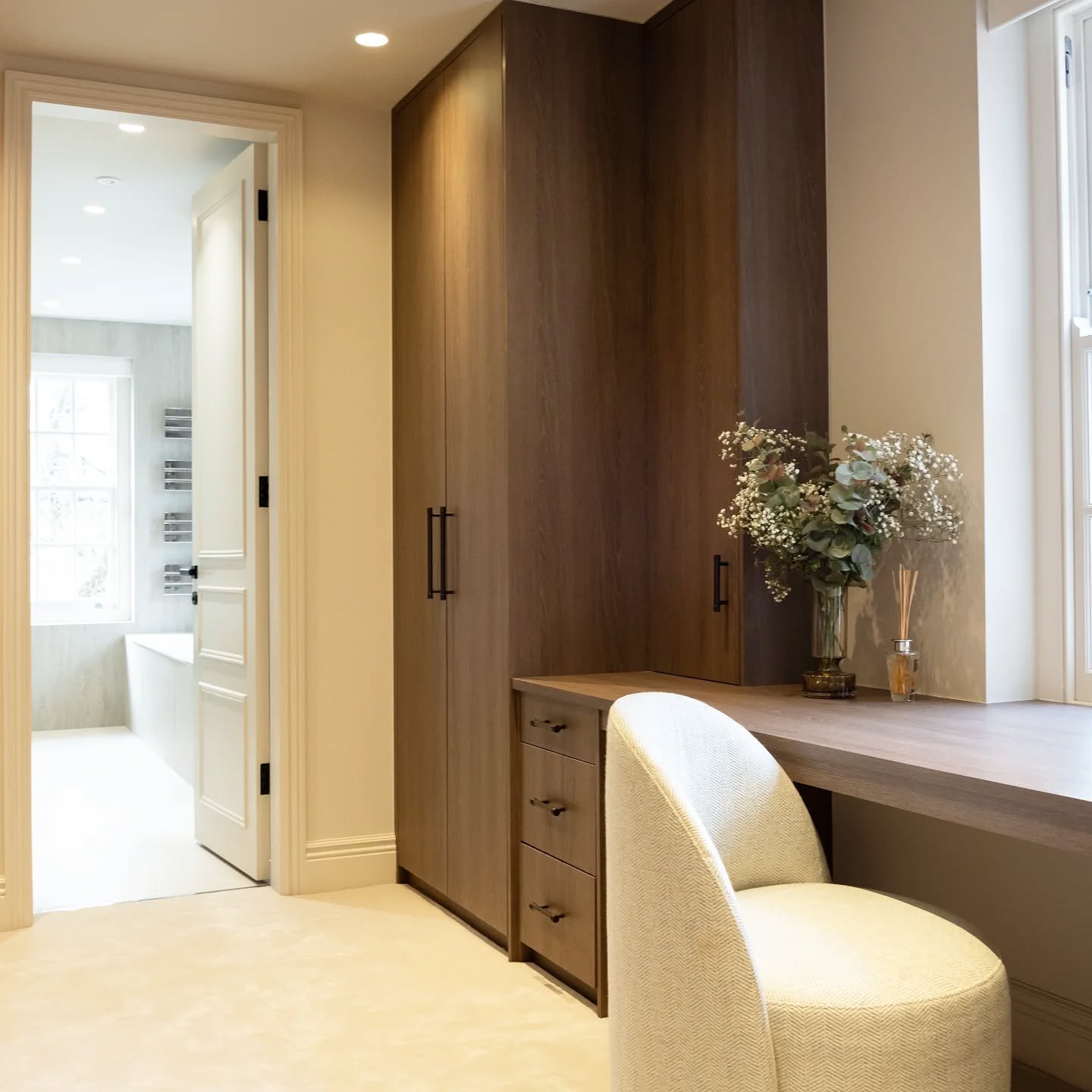 Dressing Room 

Crafted from Brown Orleans Oak, this elegant dressing room offers ample storage to suit every need. Designed with a thoughtful balance of hanging space, shelving, and drawers, it ensures effortless organization for clothing and access