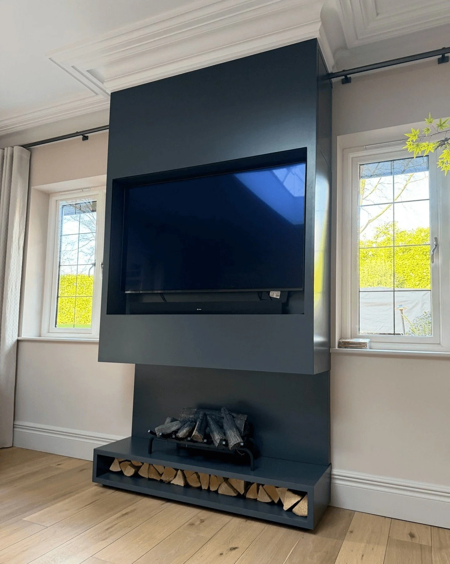 Often it's the unexpected pieces that really excite us - the ones that start off simple, but make a real impact. 

This TV unit with added log storage helps to bring a fresh, modern twist to a classic home. 

A bold choice that definitely paid off! 
