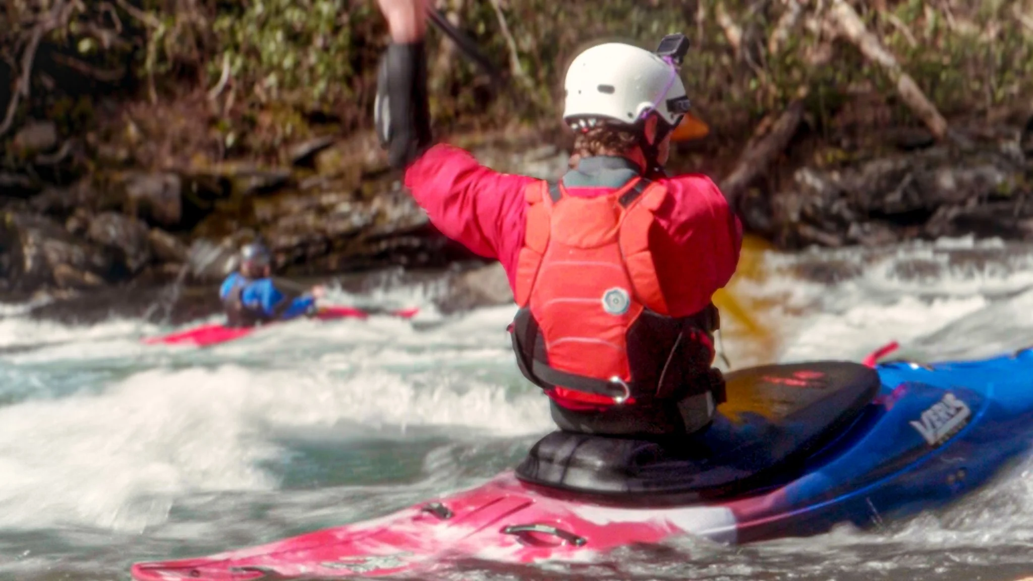 Canoe paddler in a level six king spray skirt on the Chattogga River