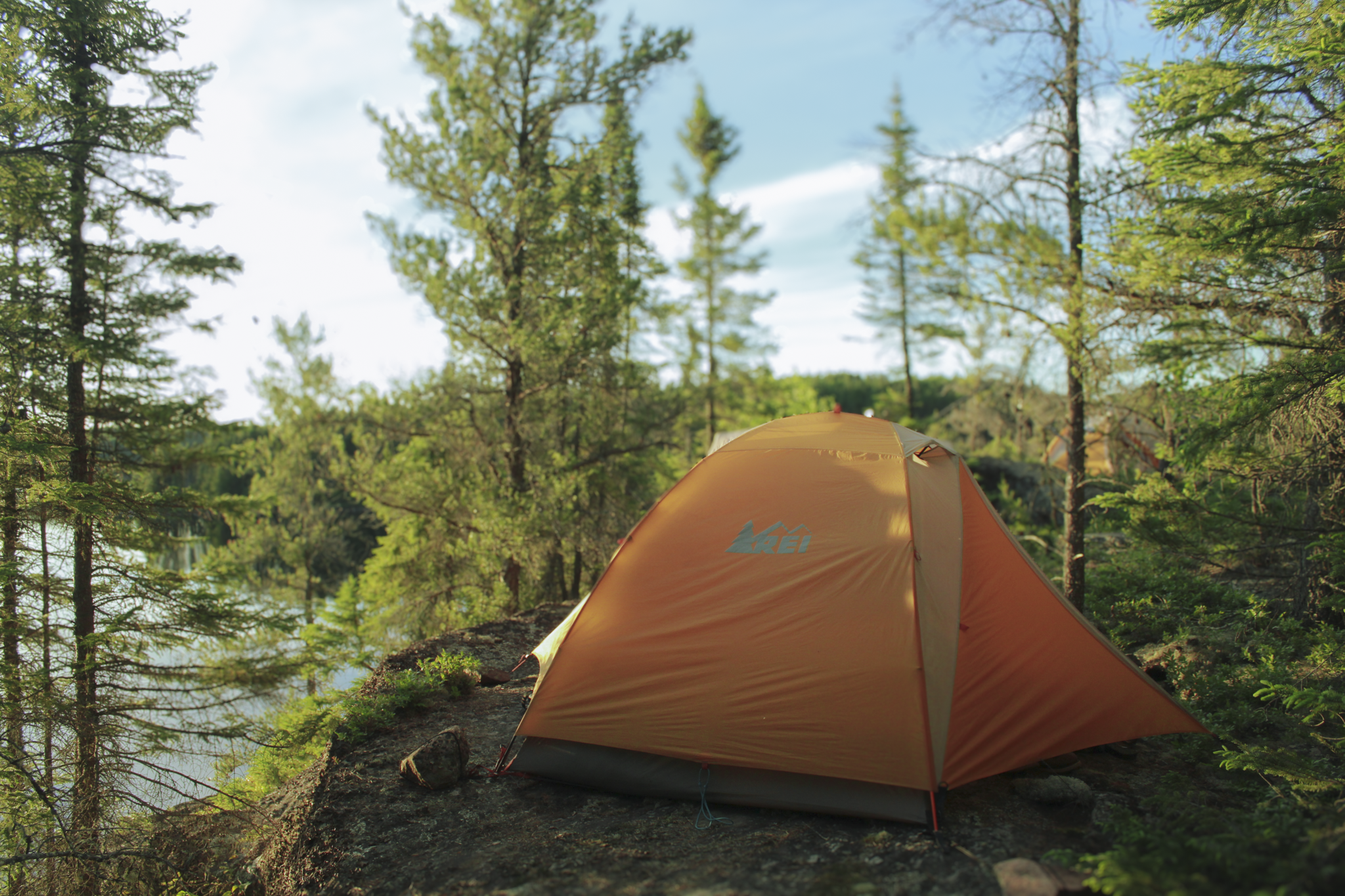 REI Half Dome Tent sitting on Canadian Shield near Rainy Lake Ontario