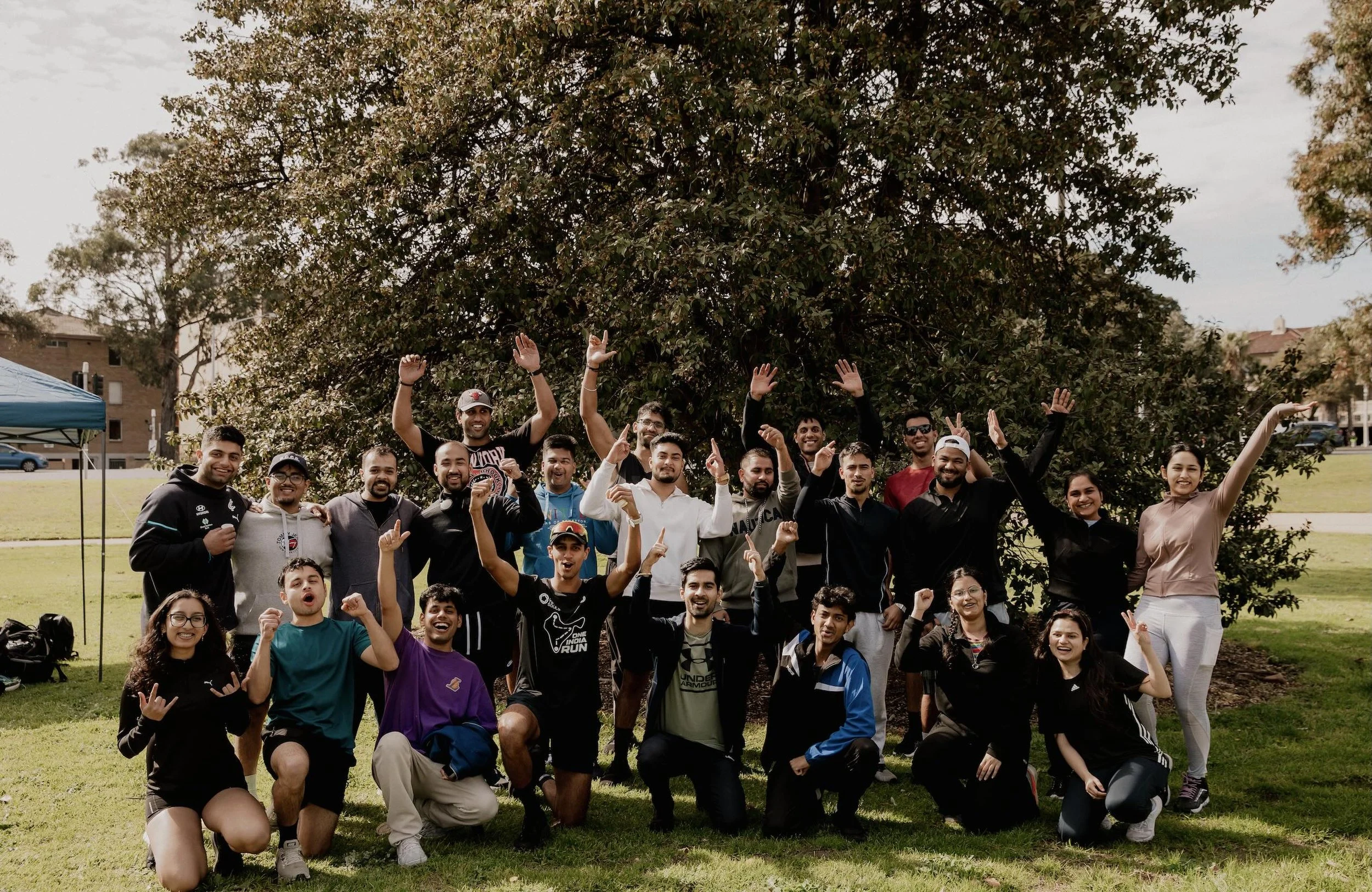 The Dharma Downunder run club showing support for the One India Run project in Melbourne Australia, prior to the run starting.
