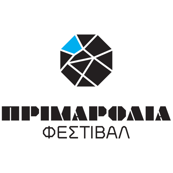 Logo with a black, faceted geometric shape resembling a stylized eye or gemstone, with a blue highlight in the upper left facet. Below the shape, there is Greek text that reads 'ΠΡΙΜΑΡΔΑΛΑ' and 'ΦΕΣΤΙΒΑΛ'.