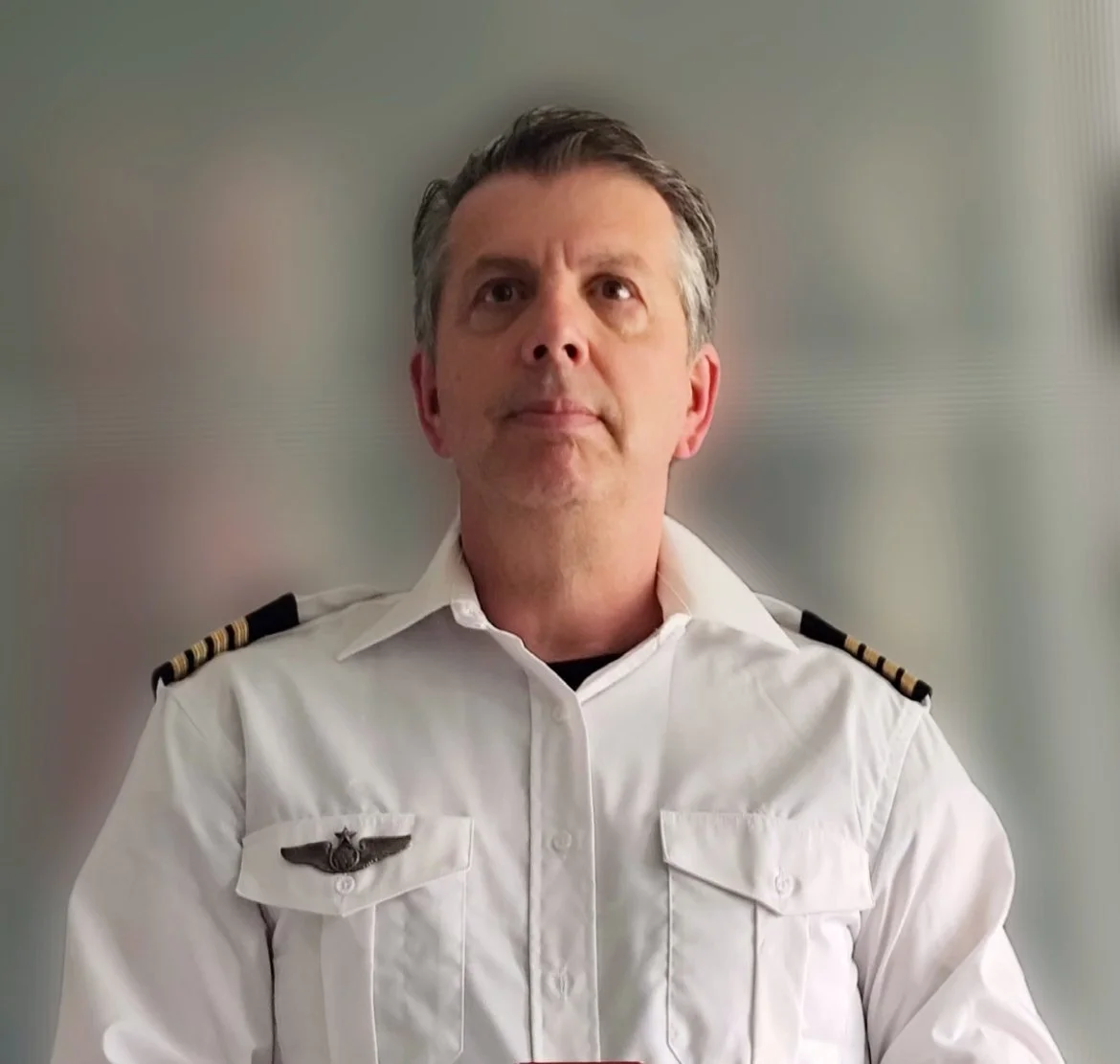 pilot-wearing-pilot-uniform-volunteering-with-renewed-hope