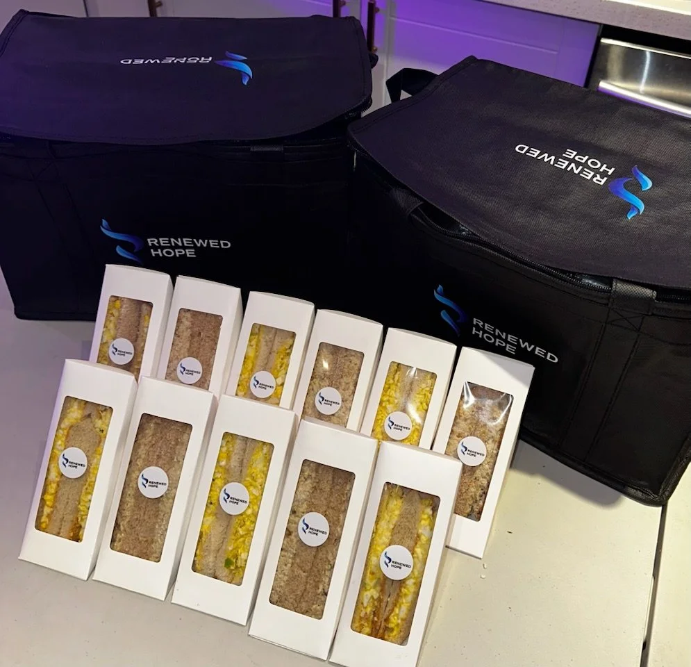 boxed-lunches-lined-up-ready-to-be-packed-and-delivered