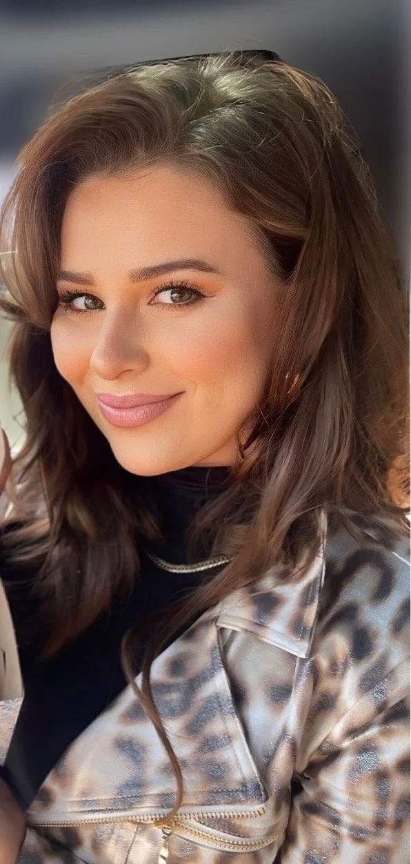 headshot-of-raquel-real-estate-head