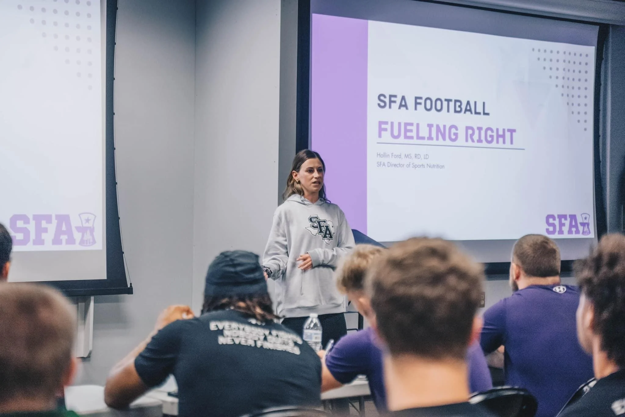 Sports nutrition education talk for athletes and coaches during a team workshop presentation