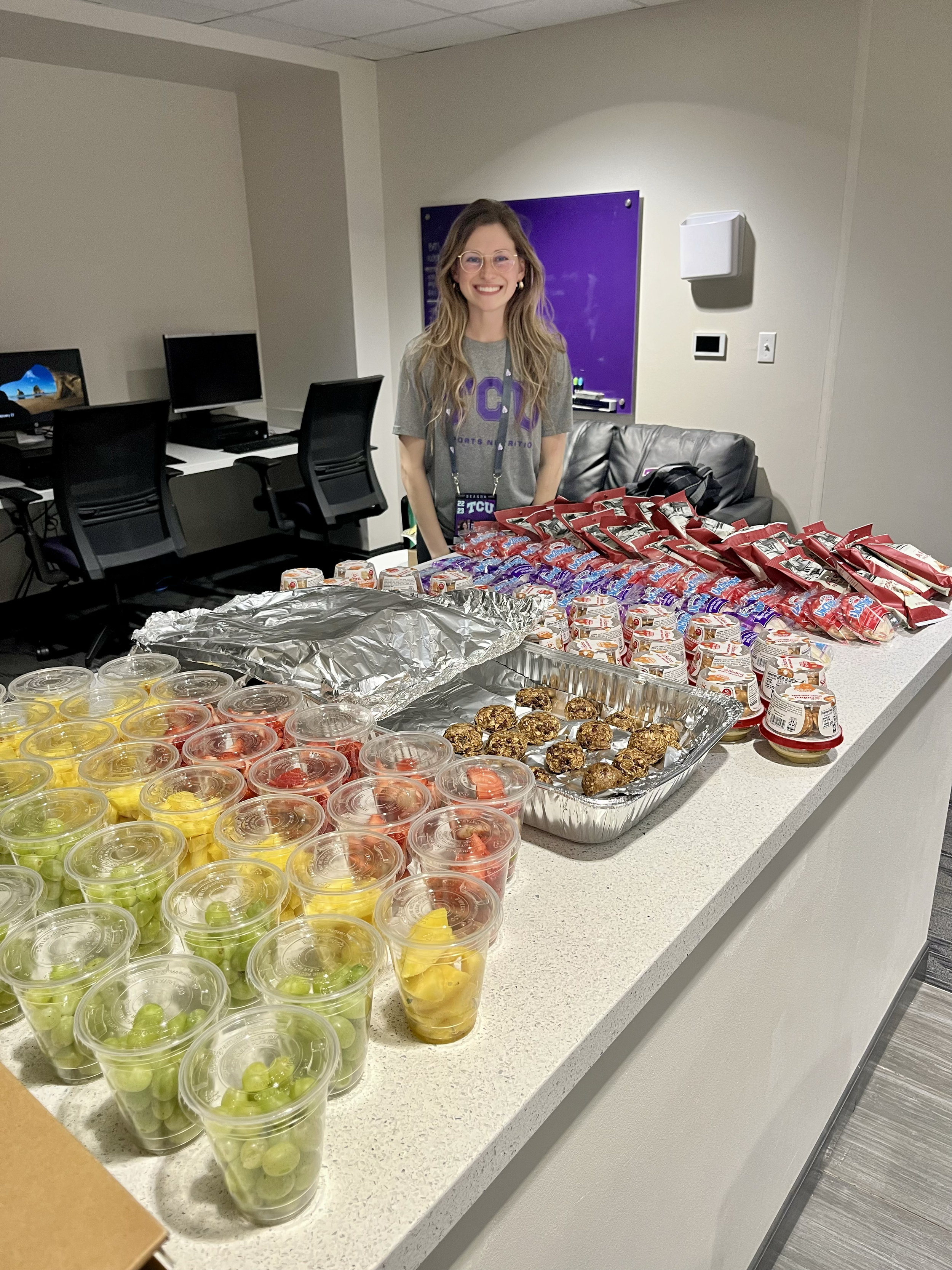 Sports dietitian leading team sports nutrition consulting session for athletes and coaches