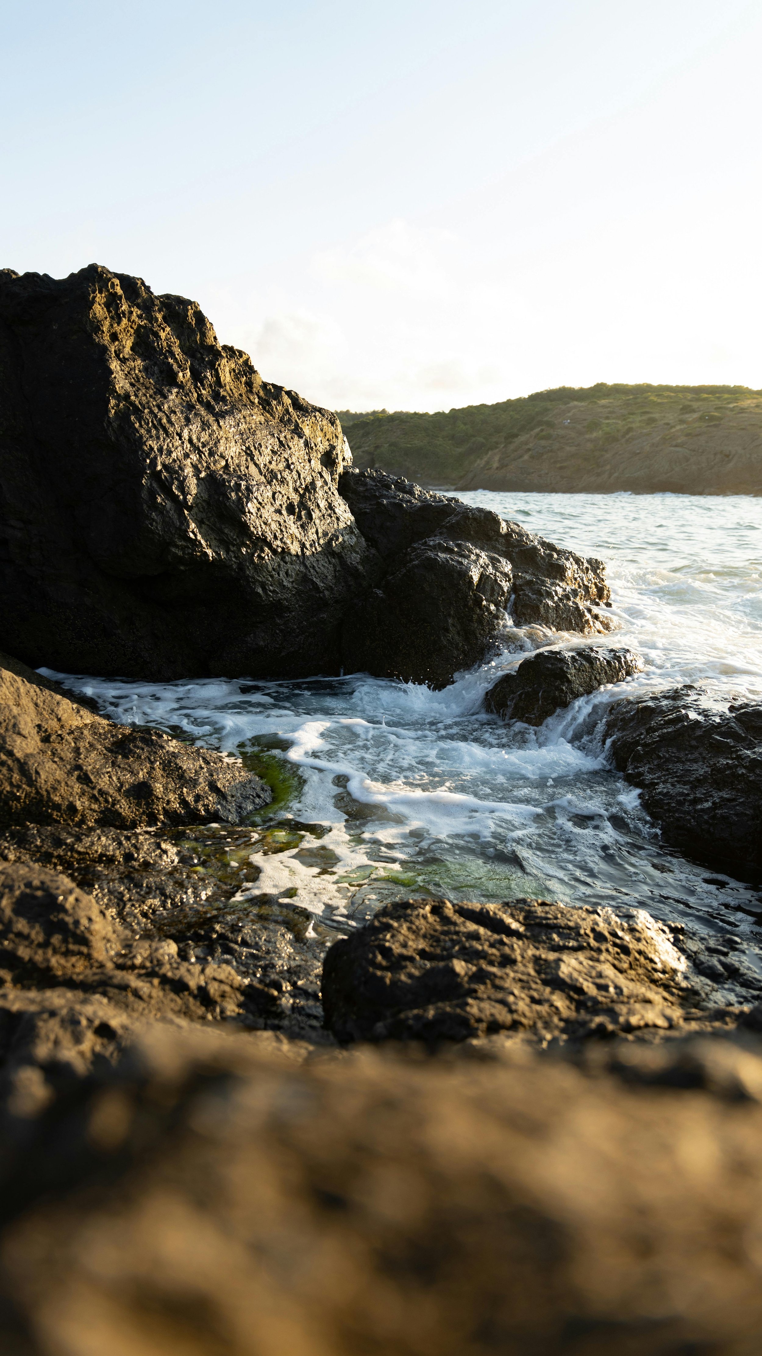 Rocky shore with waves crashing against the rocks