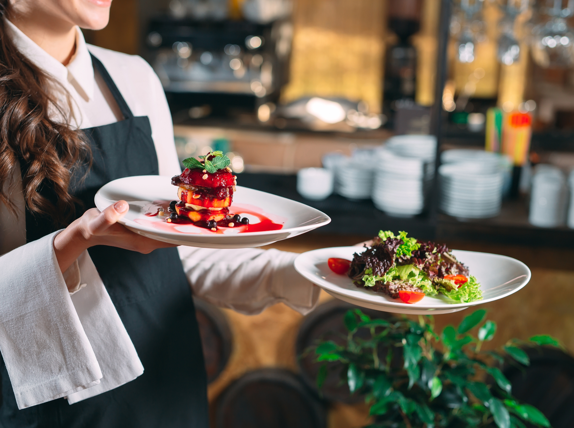 Waiter serving fine dining food.