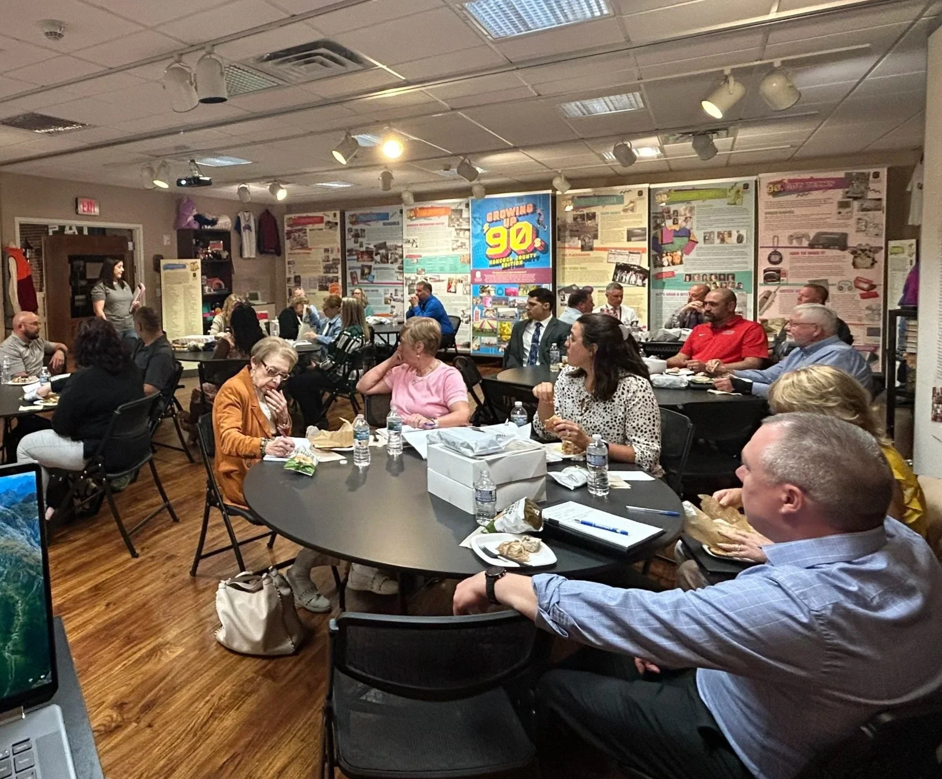 Hancock County Business Advisory Council members from schools and businesses interacting during lunch session.