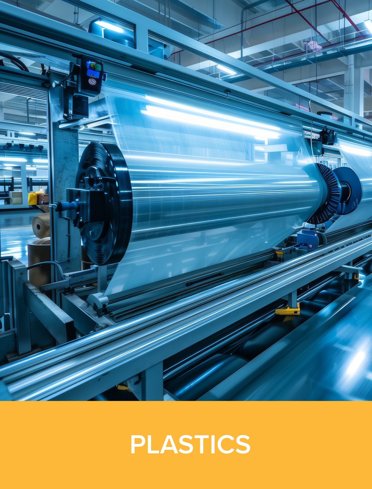 Industrial machine used in plastic manufacturing, with a large cylindrical component and conveyor system.