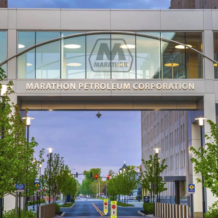 Entrance of Marathon Petroleum Corporation building with a glassed-bridge overhead in downtown Findlay, Ohio.