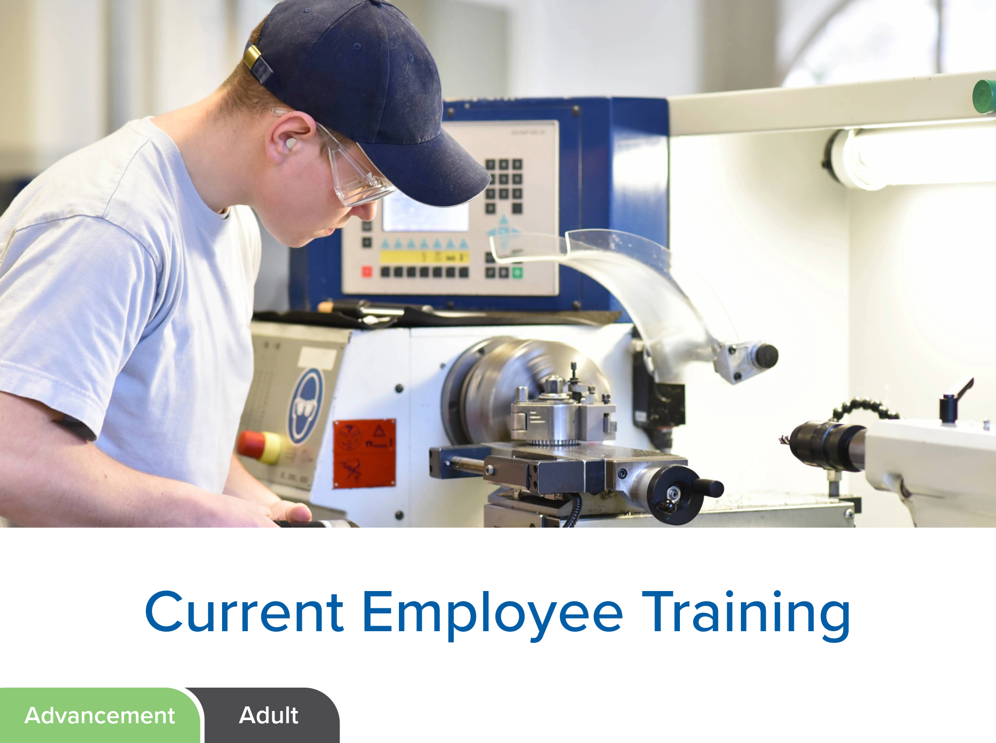 Male working on manufacturing equipment.