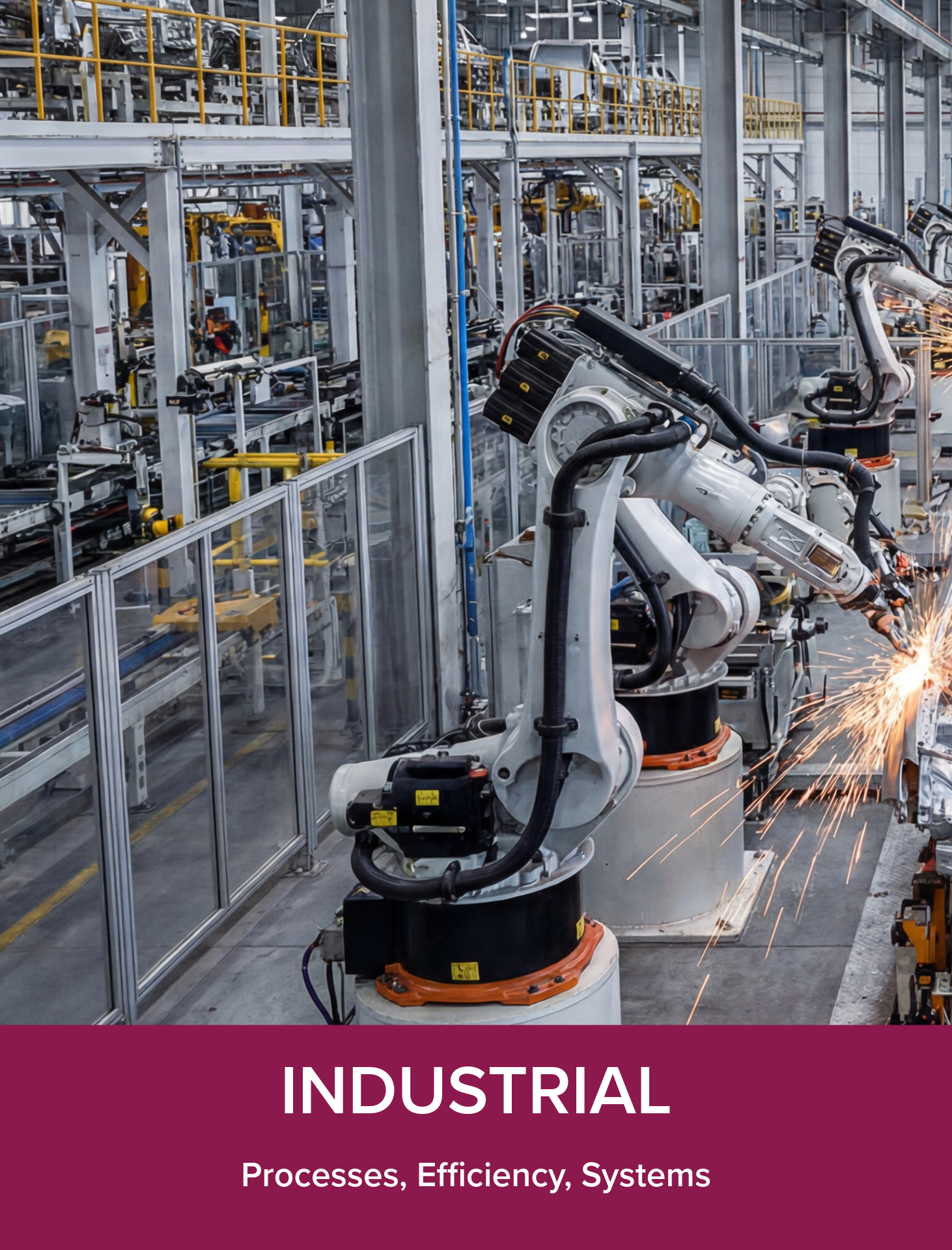 Robotic arms working on an assembly line in an industrial factory. The factory is large and equipped with multiple robotic machines performing automated tasks.