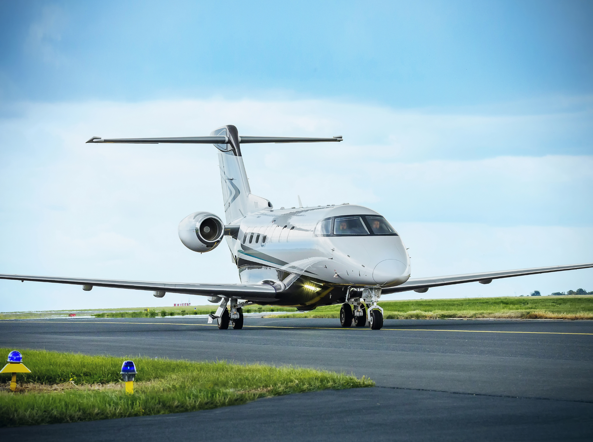 A private jet on the runway.
