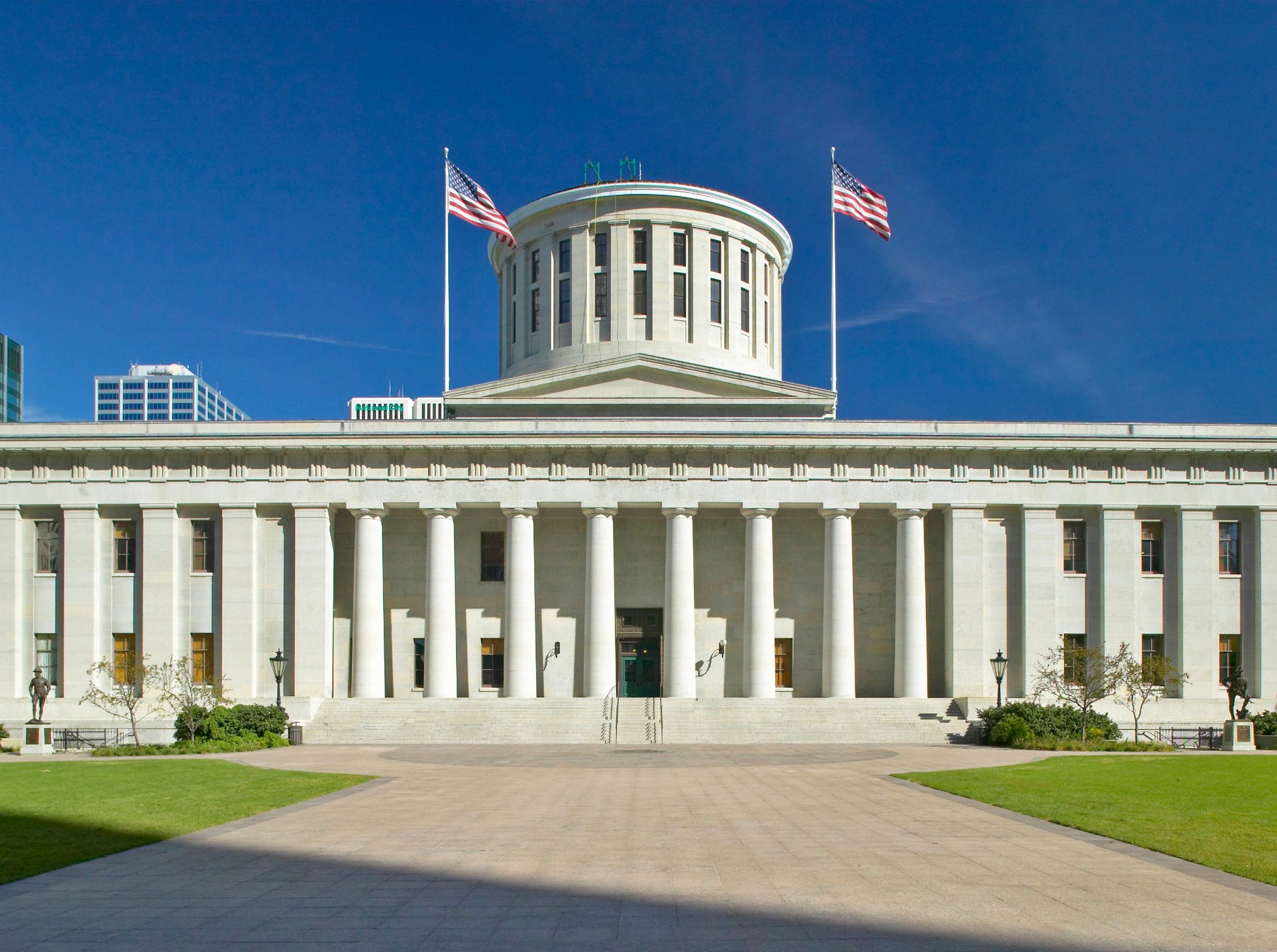 The image shows the front of  a capitol building