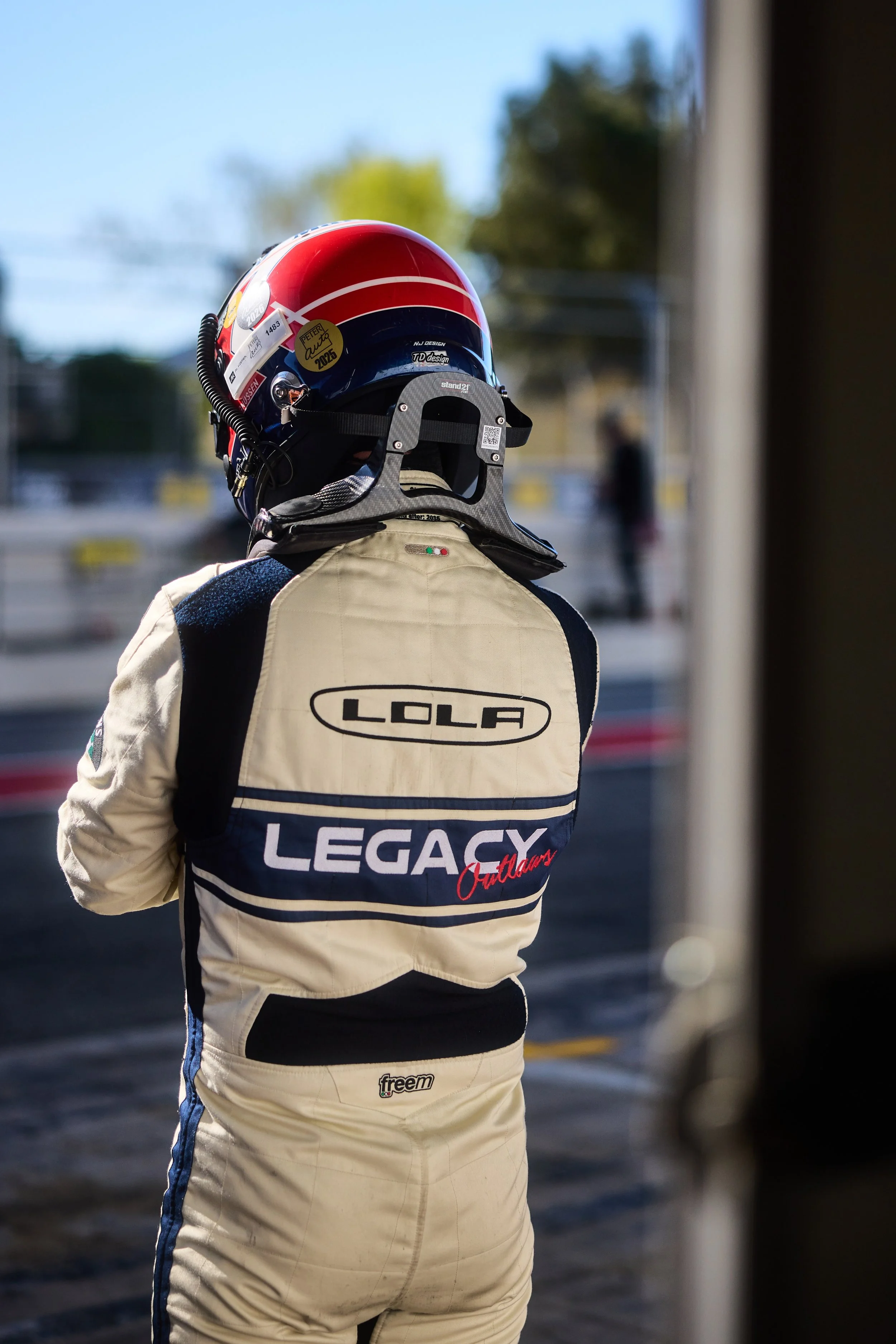 Jan Magnussen at the pit exit. Lola and Legacy Outlaws branding on the Freem suit.